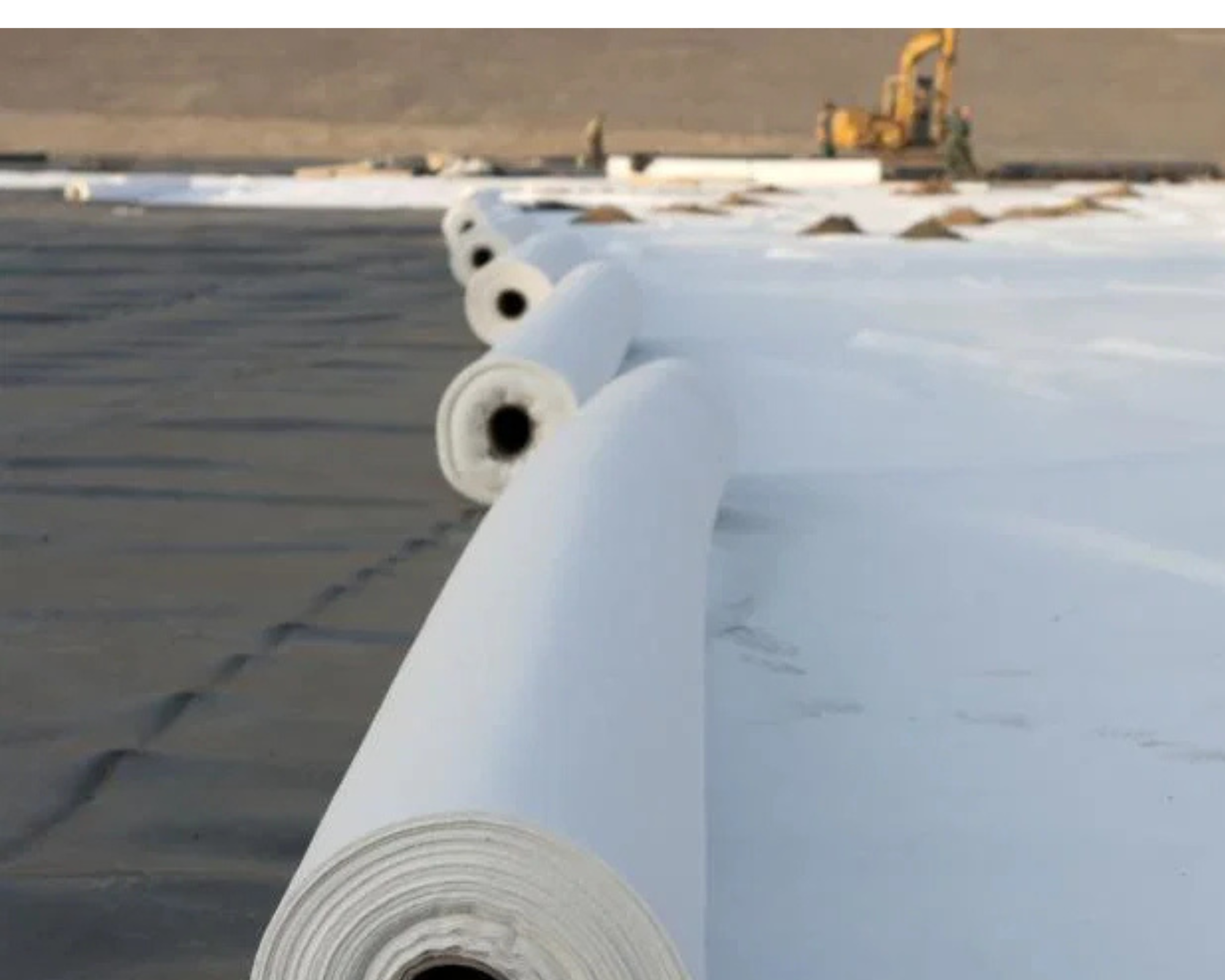 olls of non-woven geotextile installed on a civil engineering project to provide separation, filtration and ground stabilisation beneath aggregate.